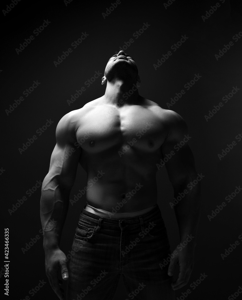 Large Built Body Black and white portrait of tall muscular man, athlete with perfect ...