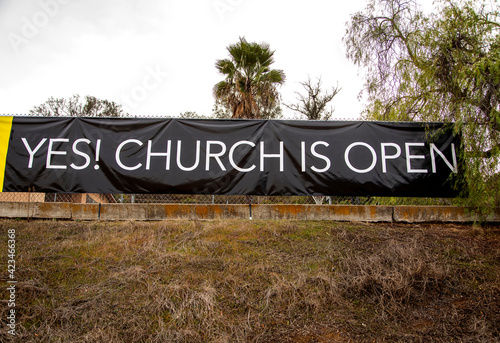 Sign Stating Church Is Now Open