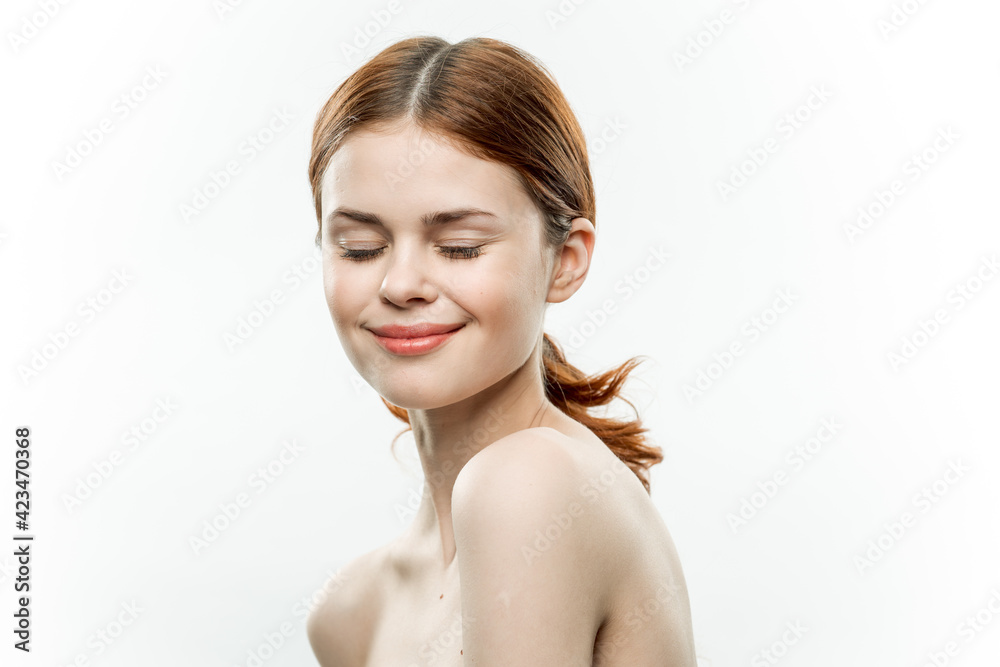 pretty woman naked shoulders cosmetics face glamor smile isolated background pretty woman naked shoulders cosmetics face glamor smile isolated background