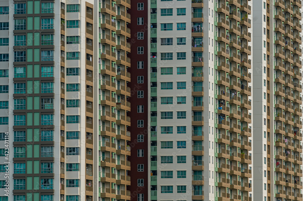 Beautiful pattern from many windows and balconies apartment building, Exterior building facade of modern apartments. Beautiful pattern from many windows and balconies apartment building, Exterior building facade of modern apartments.