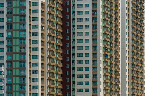 Beautiful pattern from many windows and balconies apartment building, Exterior building facade of modern apartments.