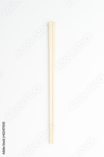 Disposable wooden chopsticks on a white background