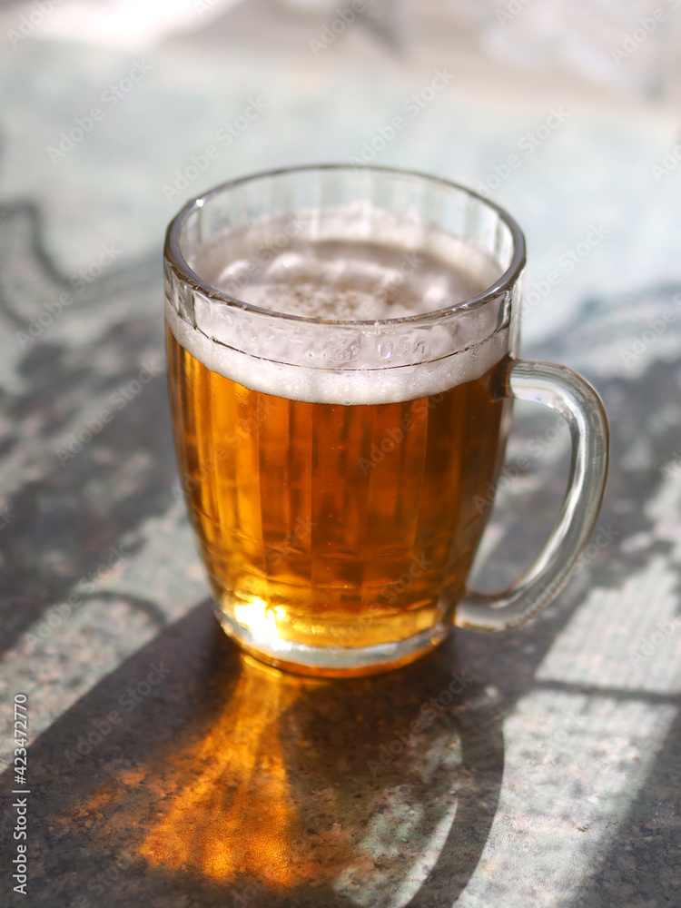 Old Soviet beer mug with beer. Old Soviet beer mug with beer.