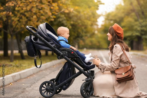 Woman and her cute baby in ...