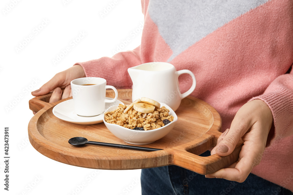 Woman holding tray with tasty breakfast on white background, closeup Woman holding tray with tasty breakfast on white background, closeup