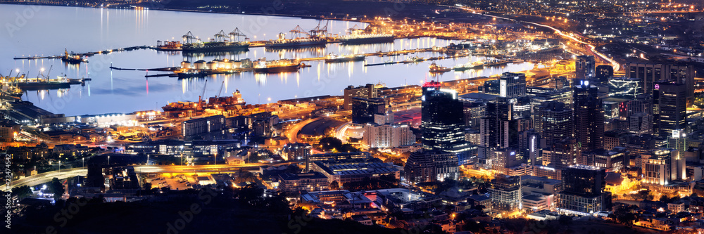 Aerial, twilight panoramic of downtown Cape Town, harbor and Table Bay
