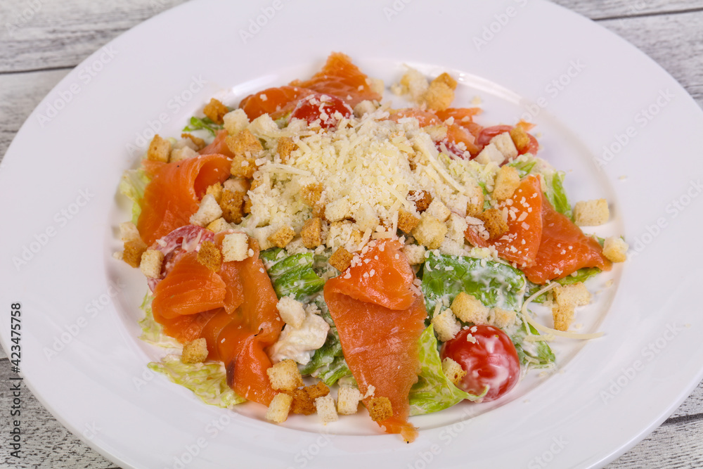 Caesar salad with salmon and parmesan Caesar salad with salmon and parmesan
