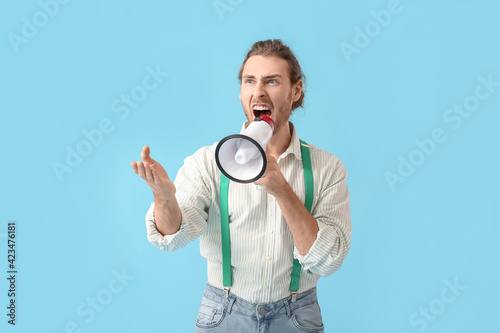 Stressed man with megaphone...