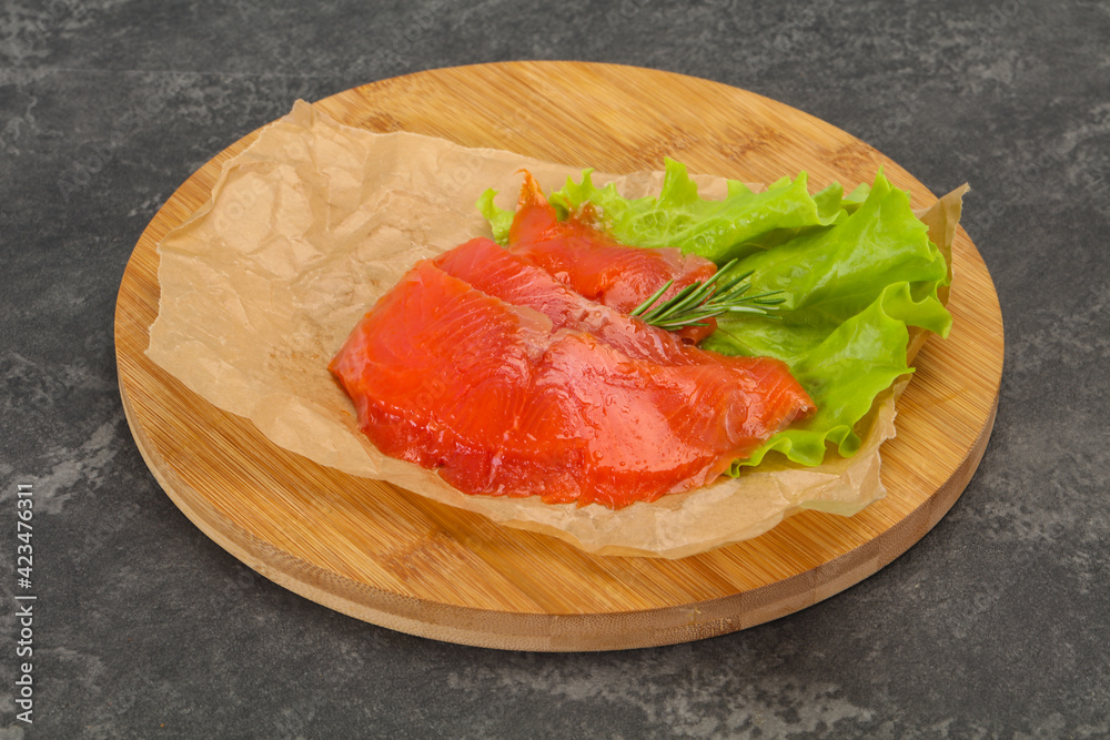 Sliced salmon fillet served rosemary Sliced salmon fillet served rosemary
