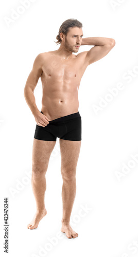 Sexy young man on white background