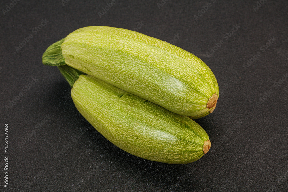 Young tasty zucchini over board Young tasty zucchini over board