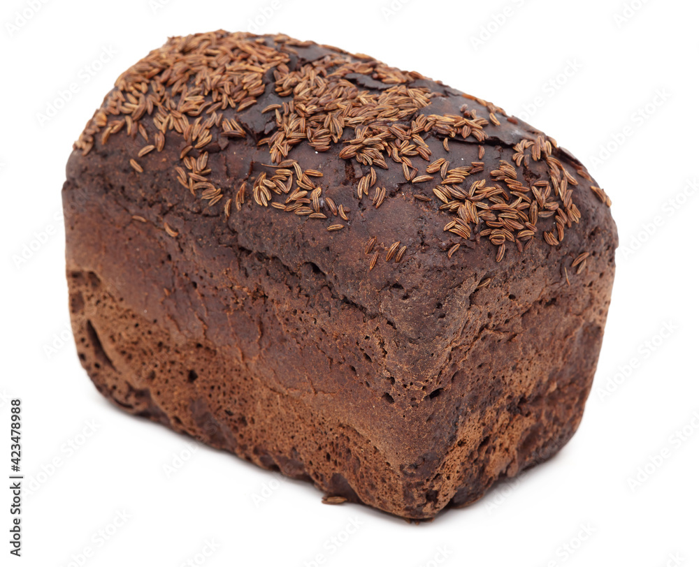 Rye bread sprinkled with cumin seeds on a white plate. Rye bread sprinkled with cumin seeds on a white plate.