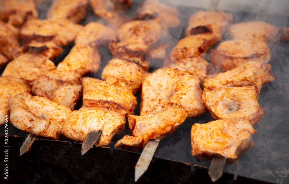 Meat on skewers is fried Meat on skewers is fried