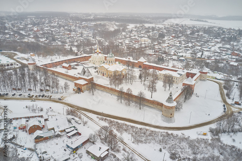 Scenic aerial view of old Kremlin in ancient russian town Zaraysk in Moscow oblast in Russian Federation. Beautiful winter look of old fortress in historical touristic russian town photo