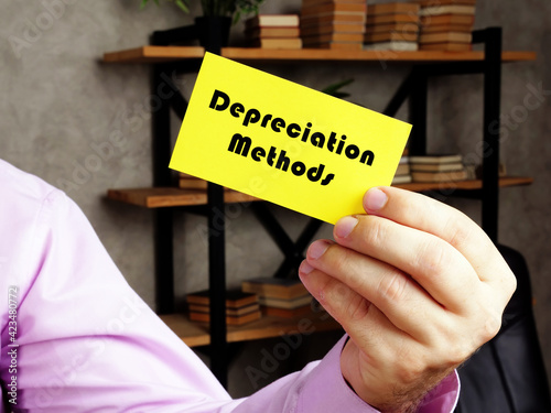  Financial concept meaning Depreciation Methods with sign on the yelow business card. photo