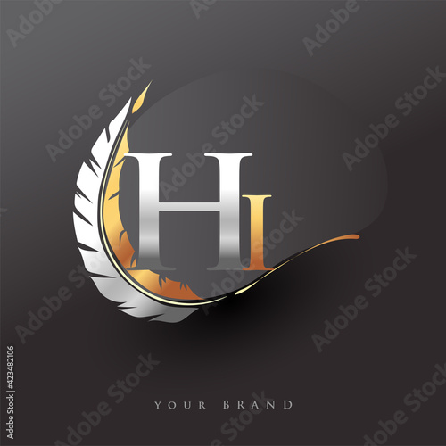 Initial letter HI logo with Feather Gold And Silver Color, Simple and Clean Design For Company Name. Vector Logo for Business and Company.