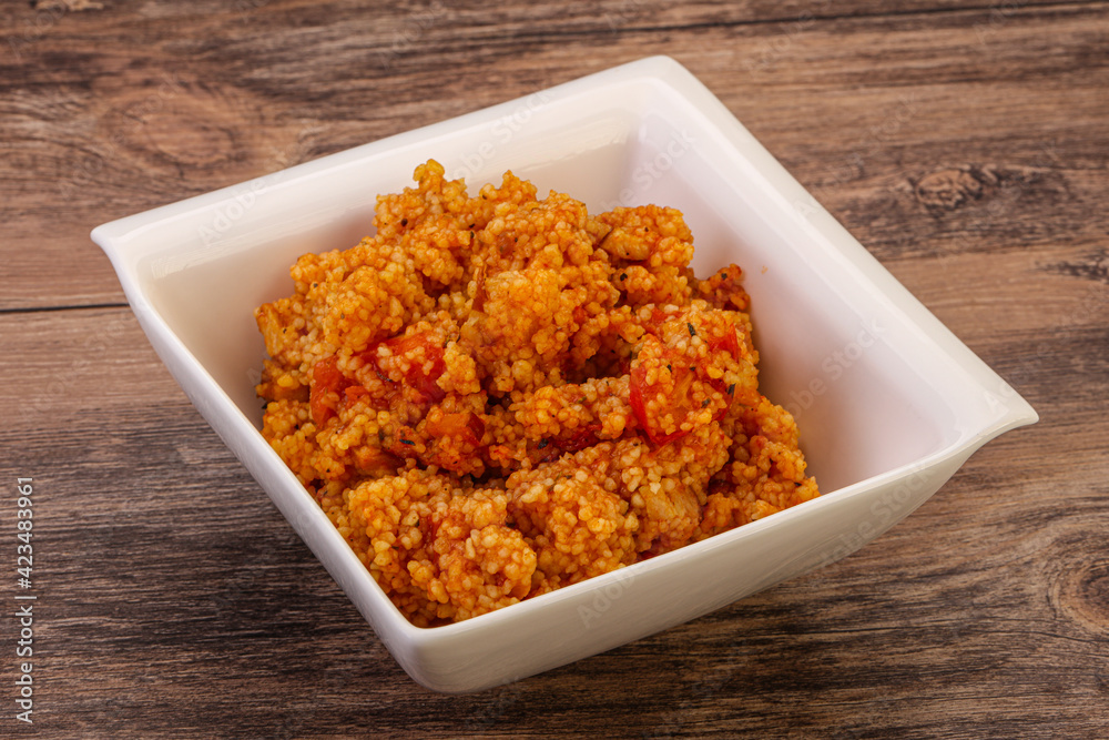 Couscos with tomato and chicken Couscos with tomato and chicken