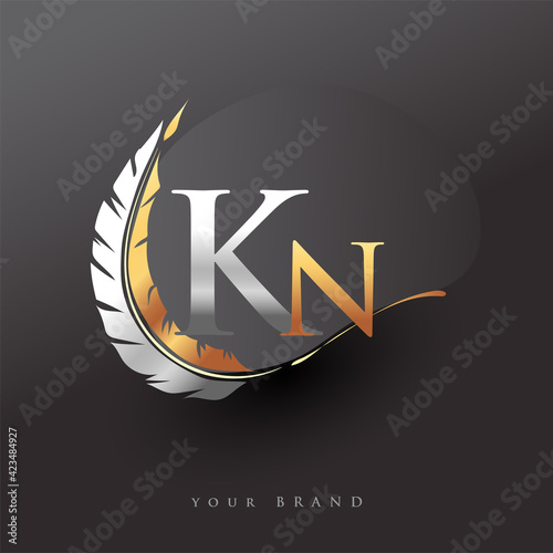 Initial letter KN logo with Feather Gold And Silver Color, Simple and Clean Design For Company Name. Vector Logo for Business and Company.