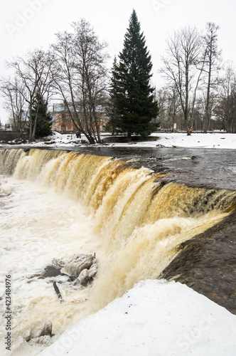 Partly frozen Keila-Joa waterfall in winter photo