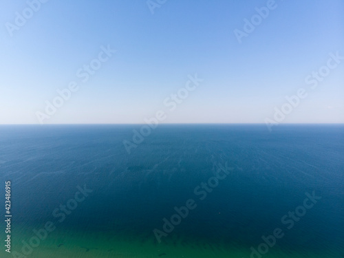 Calm Sea Ocean And Blue Sky Background