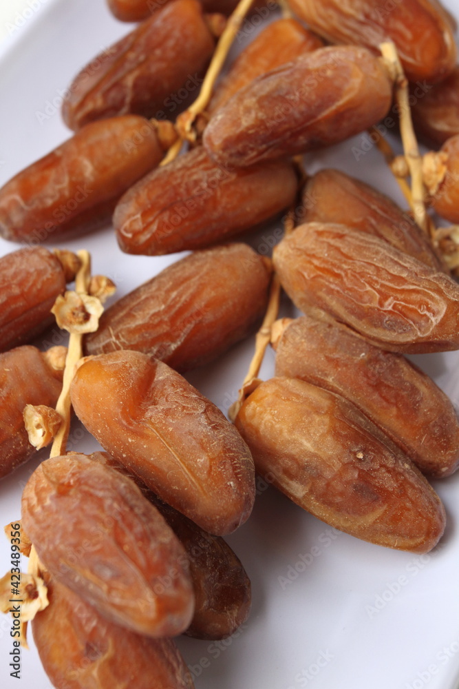 Dates (Phoenix dactylifera) in close up. Selective focus Dates (Phoenix dactylifera) in close up. Selective focus