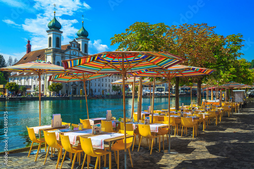 фотография Street cafe on the shore of the Reuss river, Lucerne