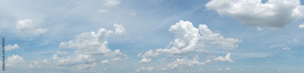 blue sky background with tiny clouds. panorama white fluffy clouds in the blue sky.Beautiful vast blue sky with amazing cloud background.Wide sky panorama with scattered cumulus clouds. blue sky background with tiny clouds. panorama white fluffy clouds in the blue sky.Beautiful vast blue sky with amazing cloud background.Wide sky panorama with scattered cumulus clouds.