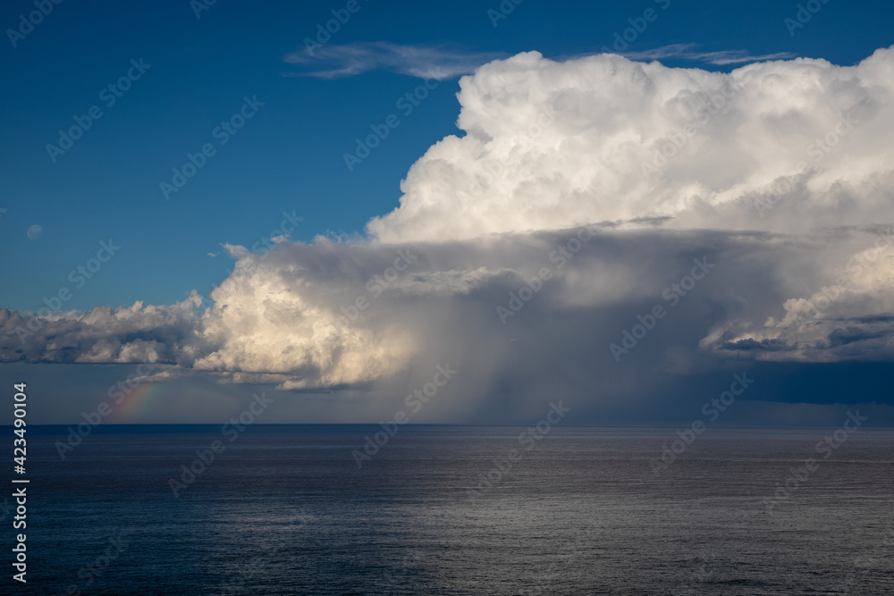 Obraz premium The storm is coming in the sea. Rainbow.