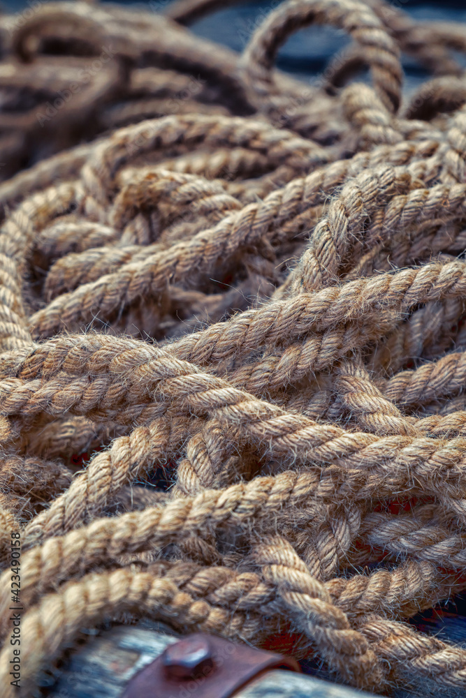 natural rope old tangled piece of tackle background marine close up