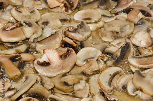 Chopped fragrant mushrooms are fried in vegetable oil