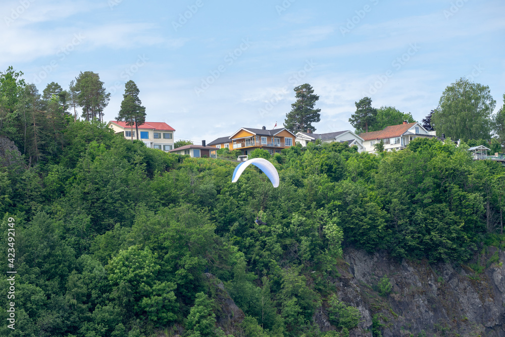 Paragliding as a way to feel like a bird.