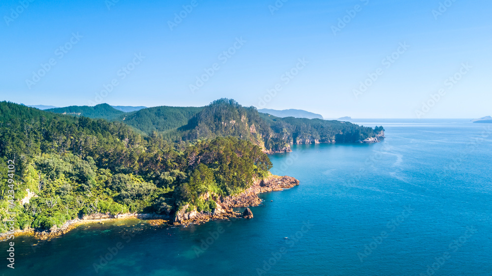 erial view of a beautiful harbour with rocky coastline. Coromandel, New Zealand.