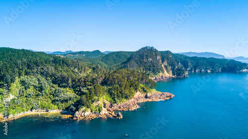 Aerial view of a beautiful harbour with rocky coastline. Coromandel, New Zealand.