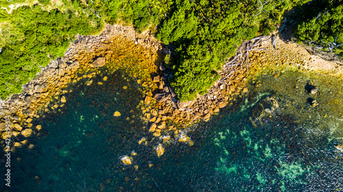 Aerial view on a rocky ocean coast. Coromandel, New Zealand.