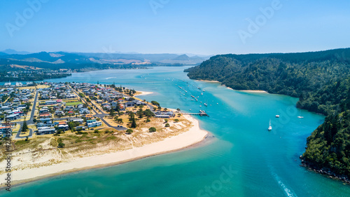 Little Town on the shore of a beautiful harbour. Coromandel, New Zealand.