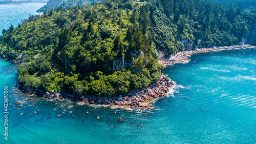 Aerial view of a beautiful harbour with rocky coastline. Coromandel  New Zealand.