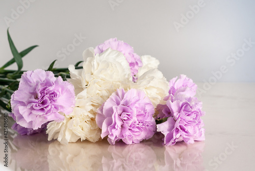 Bouquet of pastel color carnation flowers © Natalya