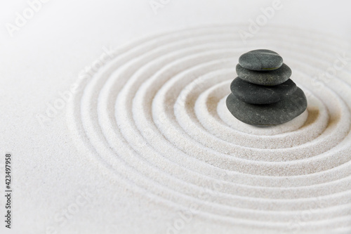 Zen japanese garden and black stones background