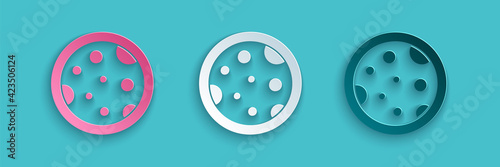 Paper cut Petri dish with bacteria icon isolated on blue background. Paper art style. Vector