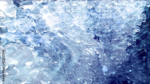 ice and water energy research a stream of luminous particles, a cycle of a stream of luminous particles. light effects moving and flexible lines in abstract style profit energy meditation