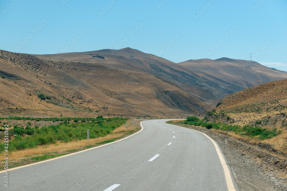 Scenic motor road in the desert mountains of Azerbaijan landscape Scenic motor road in the desert mountains of Azerbaijan landscape