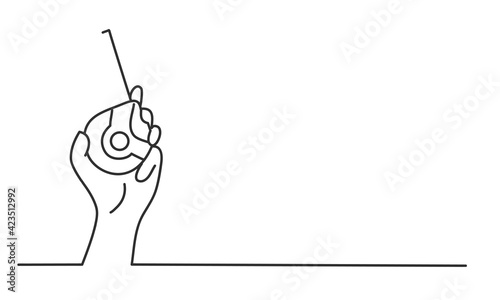 Human hand holds measuring tape. Hand drawn vector illustration.