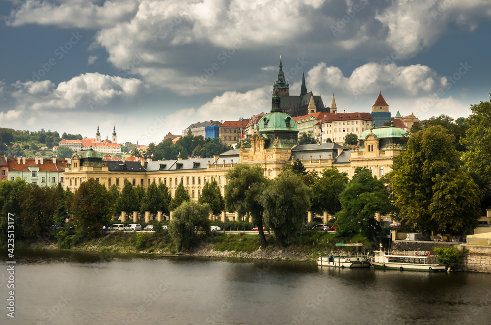 view from the river on the historic buildings of Prague 