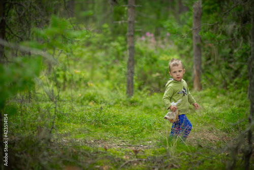 a child walks in a mushroom forest. selective focus