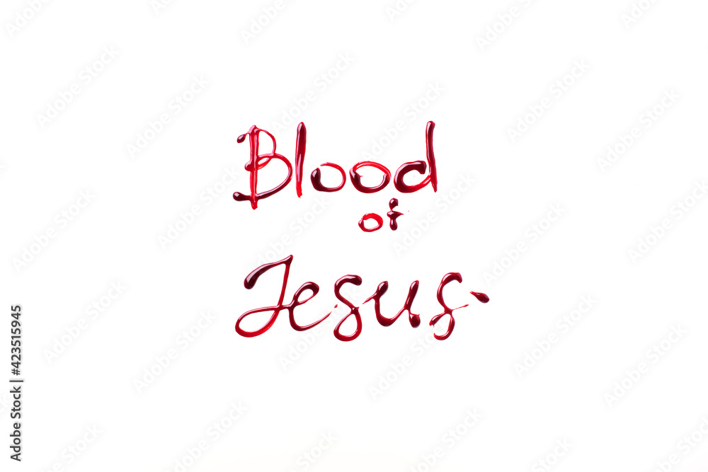 Text Blood of Jesus isolated on white background. Crucifix ox Jesus Christ made with blood. Top view. Palm Sunday, Good Friday, Easter concept, Christ resurrection. Christianity symbol and faith.