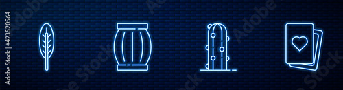 Set line Cactus, Indian feather, Gun powder barrel and Deck of playing cards. Glowing neon icon on brick wall. Vector