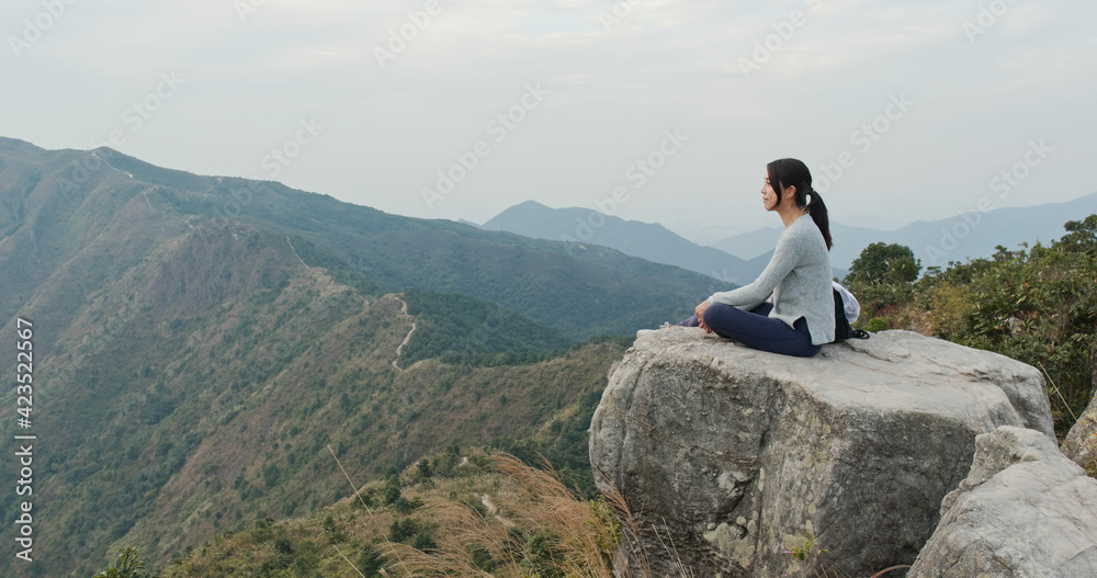 Woman enjoy the scenery view on mountain Woman enjoy the scenery view on mountain