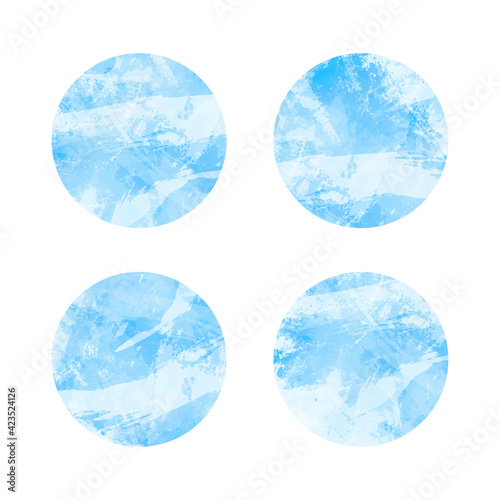 Set of abstract hand-drawn circles, spots in blue colors.Collection of sketchy round forms with strokes and dots with Image of sky,ice in frosty tones.Simple art design elements,templates. Vector