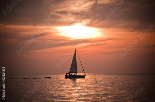 sailboat at sunset © nicolas