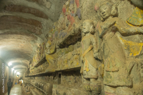 culture and people life on the wall of ancient temple, Mrauk U Myanmar